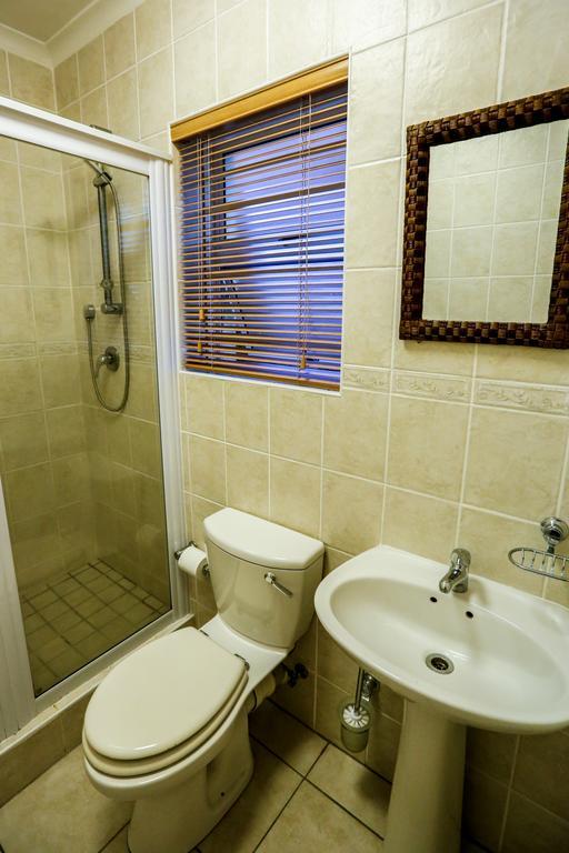 Secret Garden Guesthouse Bloubergstrand Bilik gambar