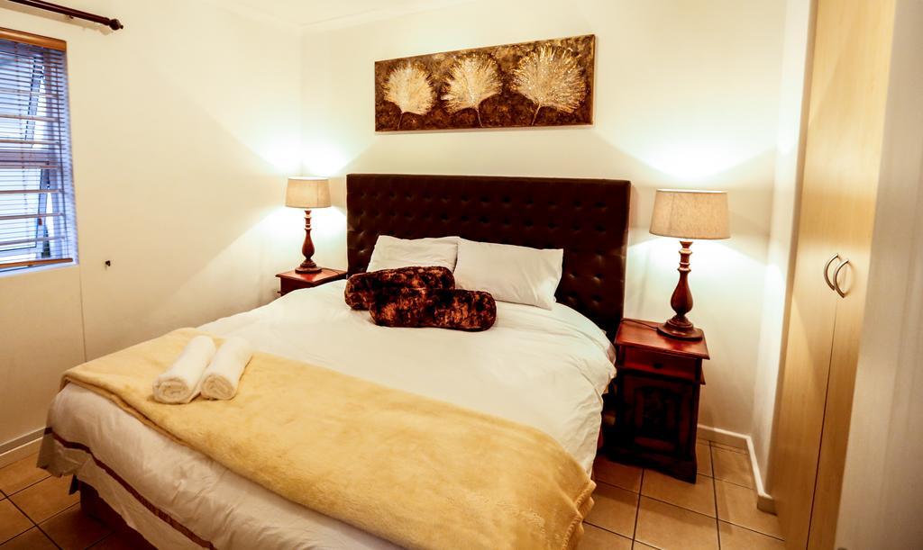 Secret Garden Guesthouse Bloubergstrand Bilik gambar