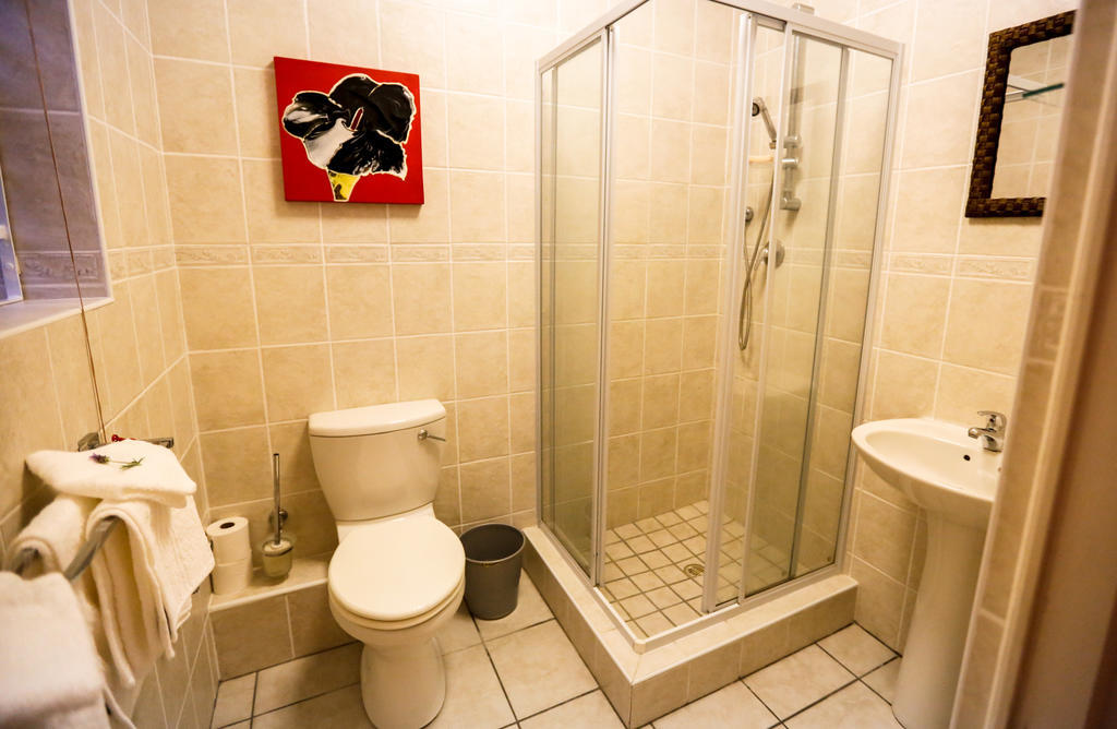 Secret Garden Guesthouse Bloubergstrand Bilik gambar